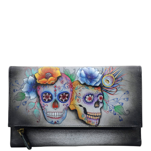 Anuschka style 1136, Handpainted Three Fold Clutch. Calaveras de Azucar painting in grey color. Featuring Snap button entry and many credit card slots.