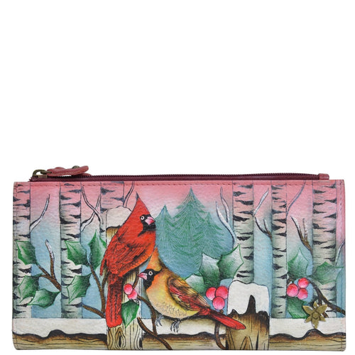 Anuschka style 1171, handpainted Two Fold Wallet. Snowy Cardinal painting in multi color.Featuring RFID blocking and many credit card slots.