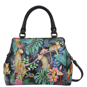 Anuschka style 690, handpainted Multi Compartment Satchel. Jungle Queen painting in Black color. Featuring inside one zippered wall pocket, one full length wall pocket, two multipurpose pockets and rear full length zippered wall pocket, slip in cell pocket with removable adjustable shoulder strap.