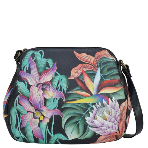 Anuschka style 691, handpainted Multi Compartment Medium Bag. Island Escape Black painting in Black color. Featuring one open zippered wall pocket, two multipurpose pockets with gusset and rear zippered wall pocket with adjustable crossbody strap.